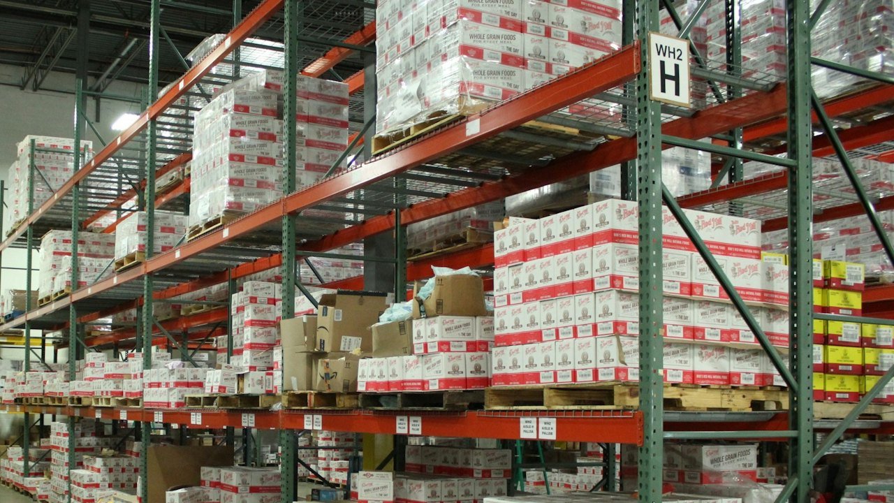 Racks of packaged food products in a warehouse