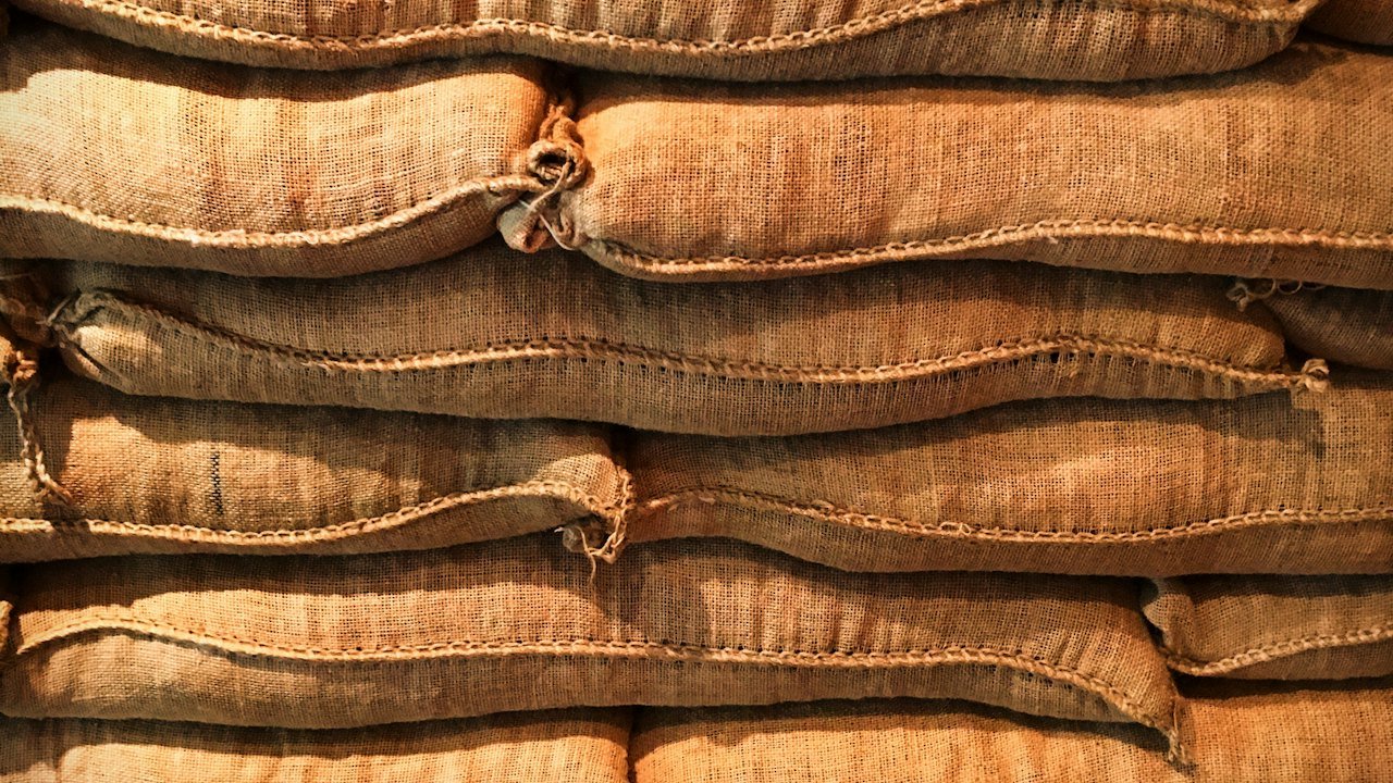 Stacked jute sacks of grain
